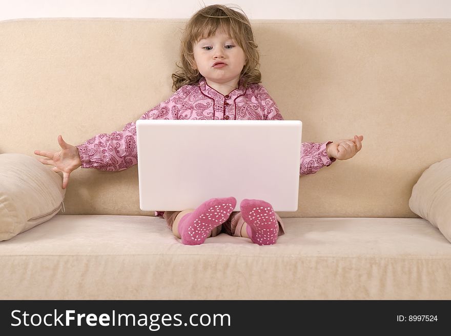 Young Girl Using A Laptop