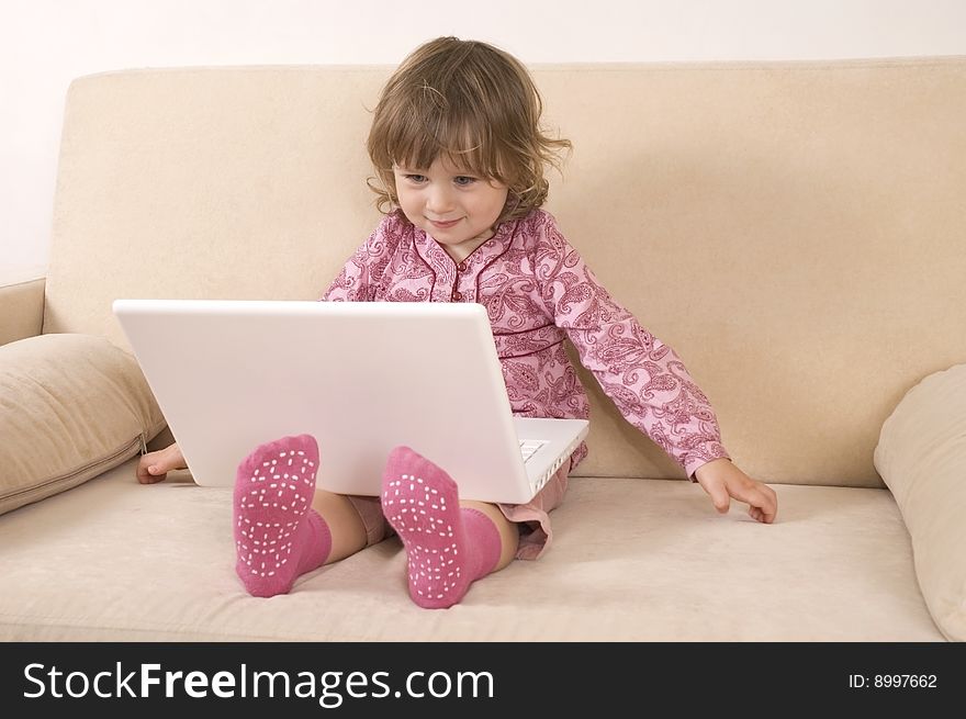 Young Girl Using A Laptop