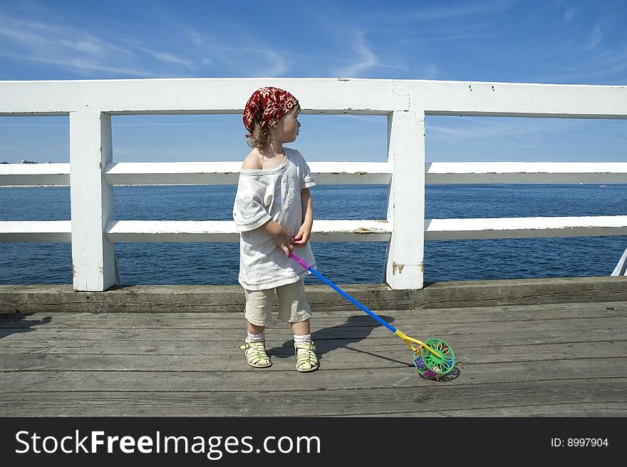 Sweet Girl On A Dock