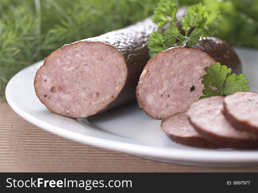 Detail of sausages with herbs