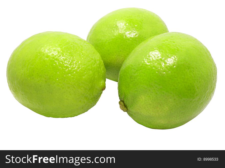 Fresh green limes isolated over white with clipping path