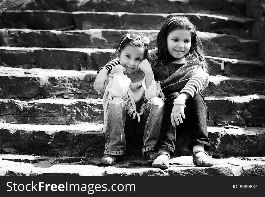 Two little sisters portraits outdoor. Two little sisters portraits outdoor