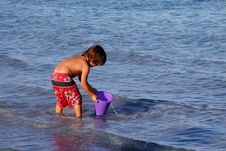 Boy Playing On The Beach. Stock Photography Boy Playing On The Beach. Stock Photography