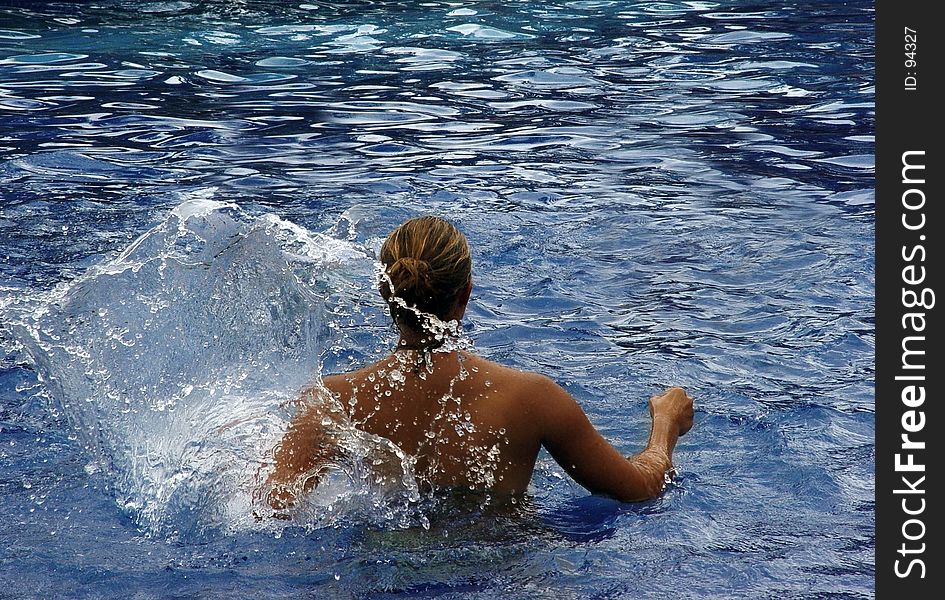 Woman in a swimming pool. Woman in a swimming pool