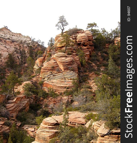 Unusual rock formations at Zion National Park in Utah. The rich colors and striations make this a fascinating place for geologists. Unusual rock formations at Zion National Park in Utah. The rich colors and striations make this a fascinating place for geologists.