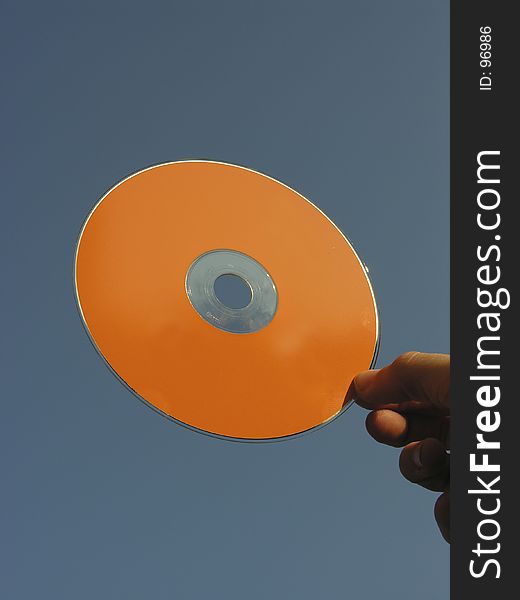 Orange cd-rom in the air