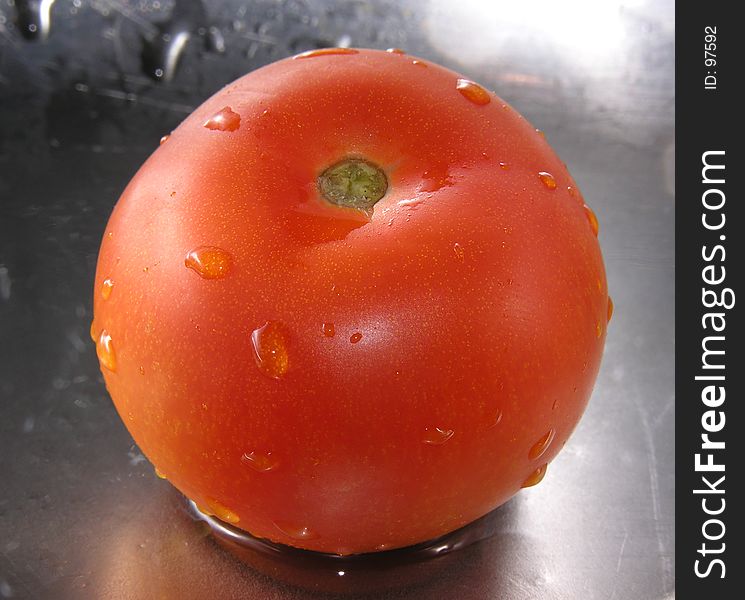 Freshly washed tomato