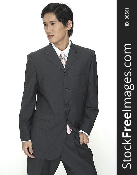 A smart and sophisticated asian businessman. A smart and sophisticated asian businessman