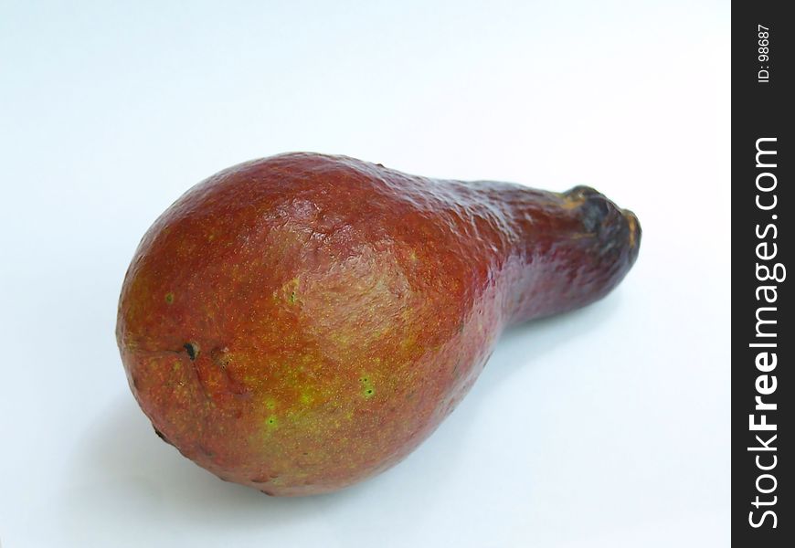 A close up view of purple red avocado (alligator pear)