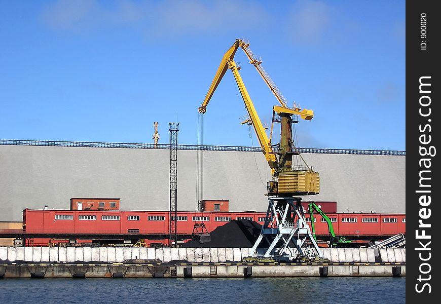 Lifting cranes in the port. Lifting cranes in the port.