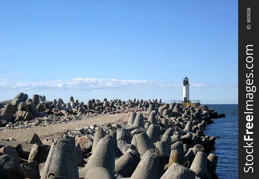 Breakwater, leaving far in a sea and beacon. Breakwater, leaving far in a sea and beacon.