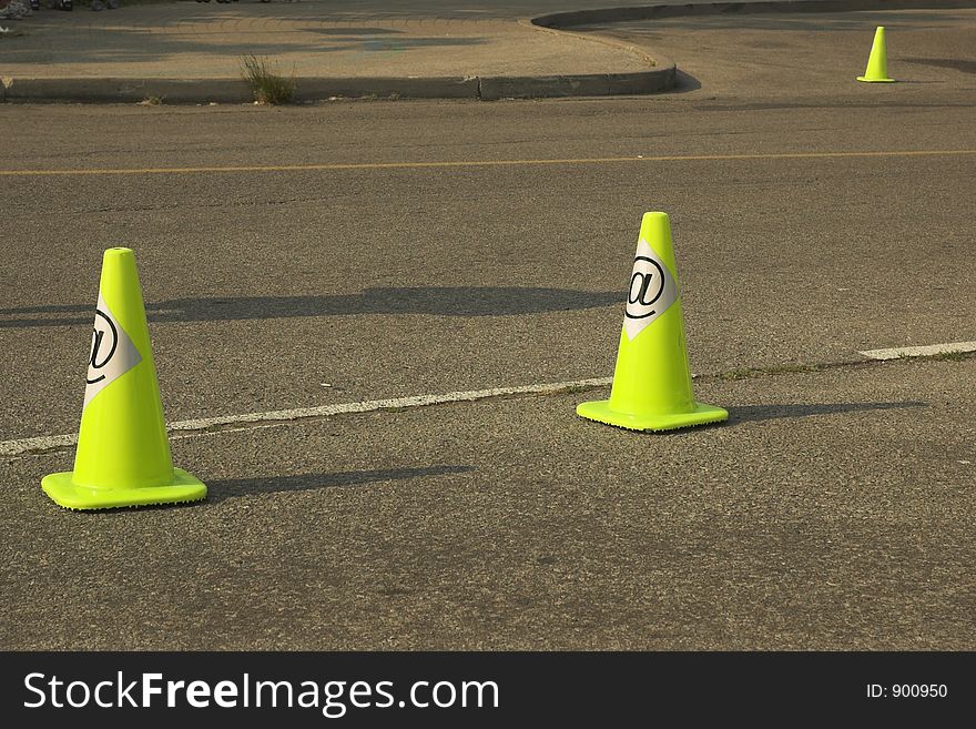 Bright yellow construction cones on information highway