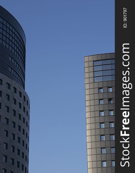 Modern office building on blue sky. Modern office building on blue sky