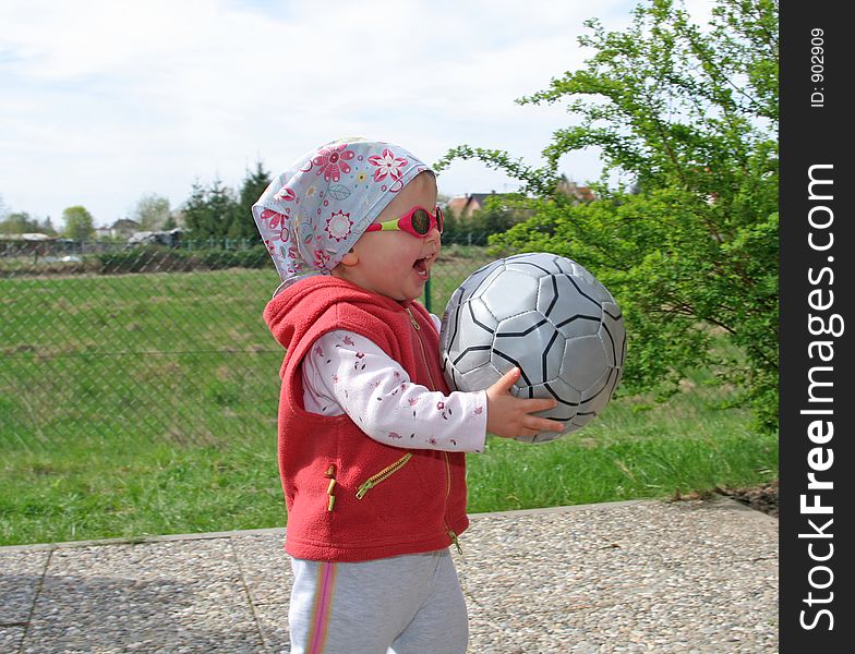 Girl with coccer ball. Girl with coccer ball