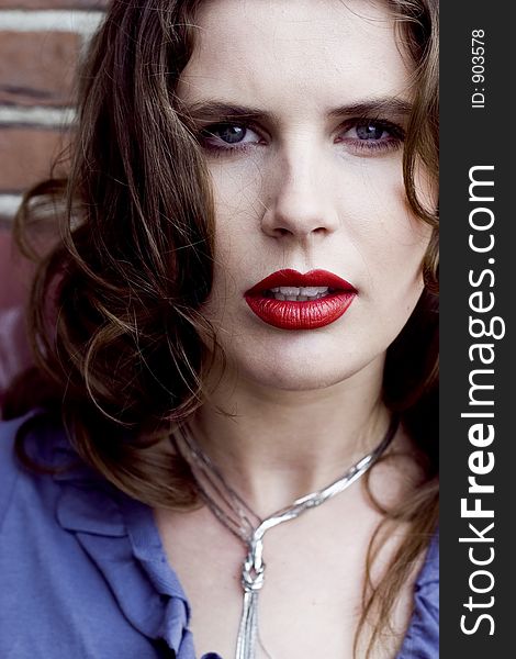 Close Up of a Beautiful Brunette Woman with Red Lips. Close Up of a Beautiful Brunette Woman with Red Lips