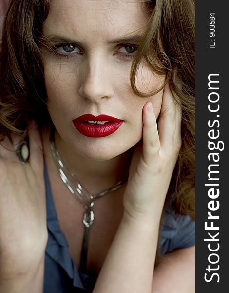 Close Up of a Beautiful Brunette Woman with Red Lips. Close Up of a Beautiful Brunette Woman with Red Lips