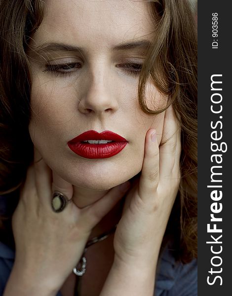 Close Up of a Beautiful Brunette Woman with Red Lips. Close Up of a Beautiful Brunette Woman with Red Lips
