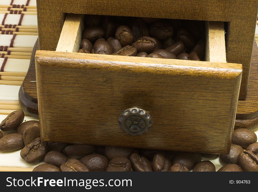 Coffee beans scattered and  in drawer