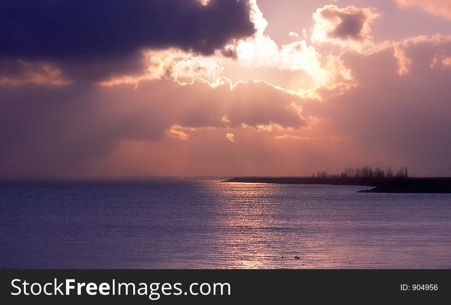 Beautiful sunset on a lake in the Netherlands. Beautiful sunset on a lake in the Netherlands