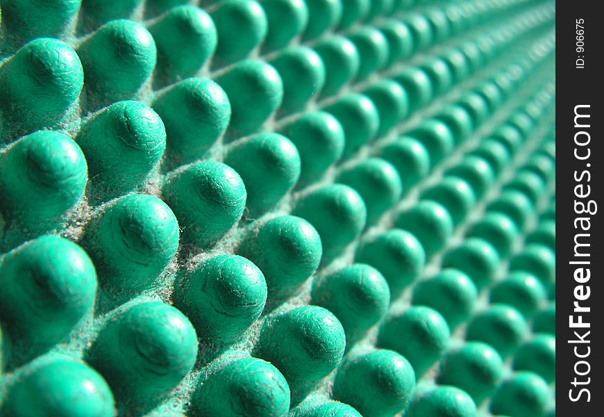 Picture of the texture detail of a slipper , foot wear, looks like a prop set out of Alien egg shells. Picture of the texture detail of a slipper , foot wear, looks like a prop set out of Alien egg shells