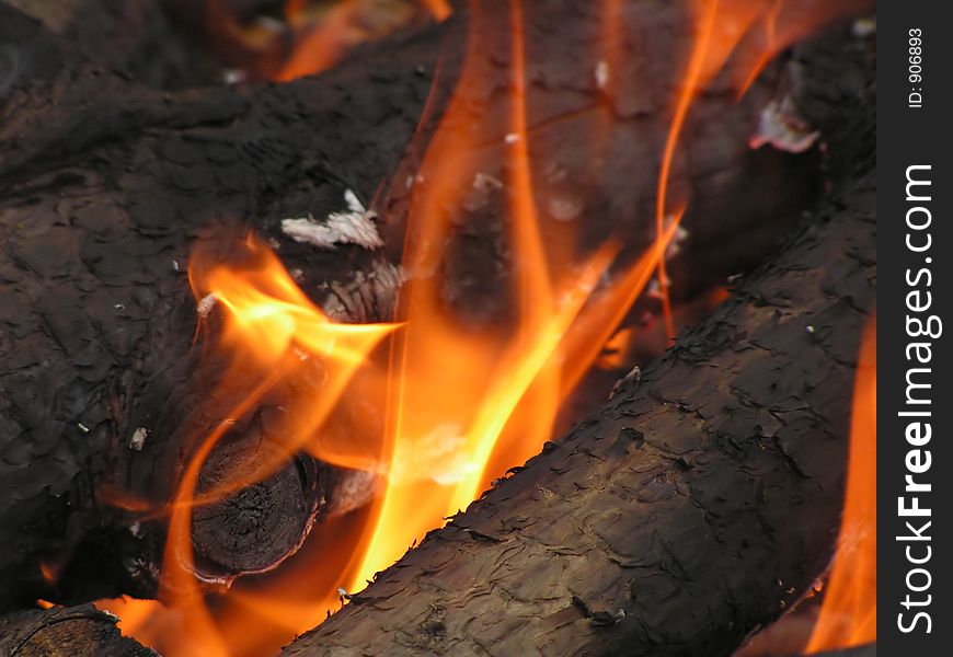 A close-up of the flames in a camp-fire. A close-up of the flames in a camp-fire