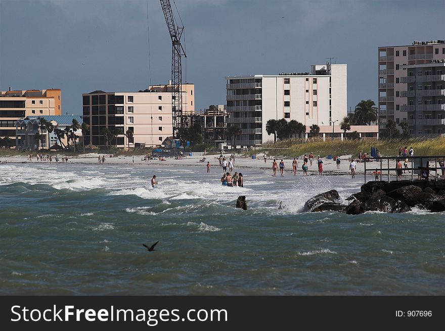 Enjoying day at the beach, new construction on the beach. Enjoying day at the beach, new construction on the beach