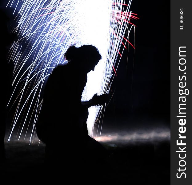 Girl playing with fireworks