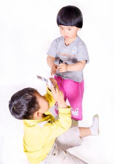 Boy Taking Picture Of Girl Stock Image