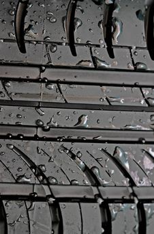 Close-up Of Car Tire With With Water Drops Royalty Free Stock Images