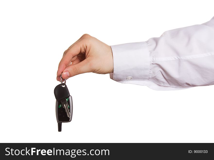 The male hand holds keys. Isolated on white. The male hand holds keys. Isolated on white.