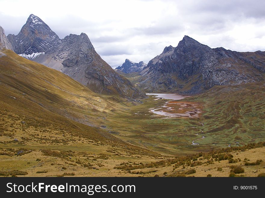 Rolling hills in broad glacial valley,  Cordillera Huayhuash, Andes, Peru, South America