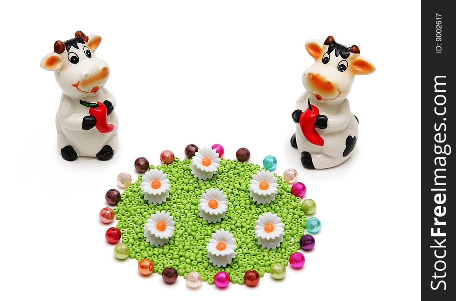 Two Ceramic Cows And A Flower Meadow From Beads