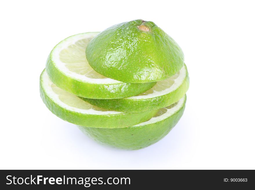 Fresh green lime isolated on white