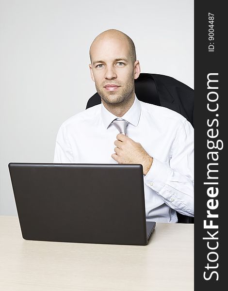 Young businessman with silver tie