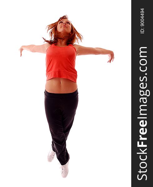 Young attractive teenage dancing over isolated white background