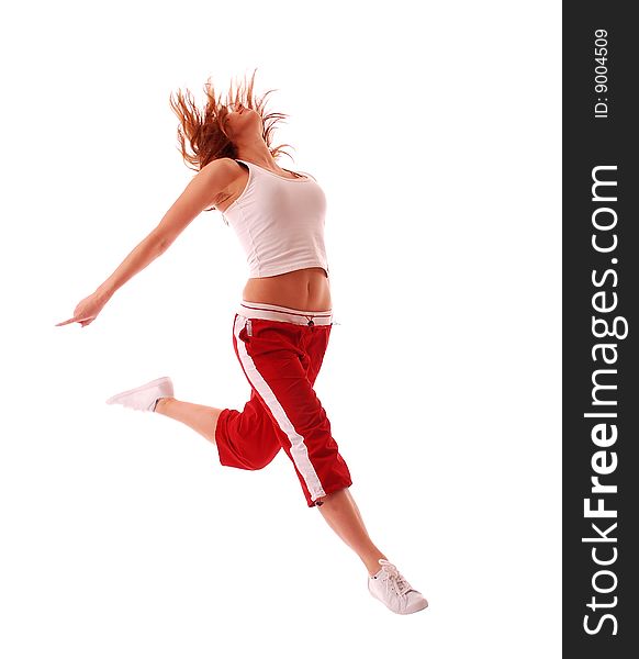 Young attractive teenage dancing over isolated white background