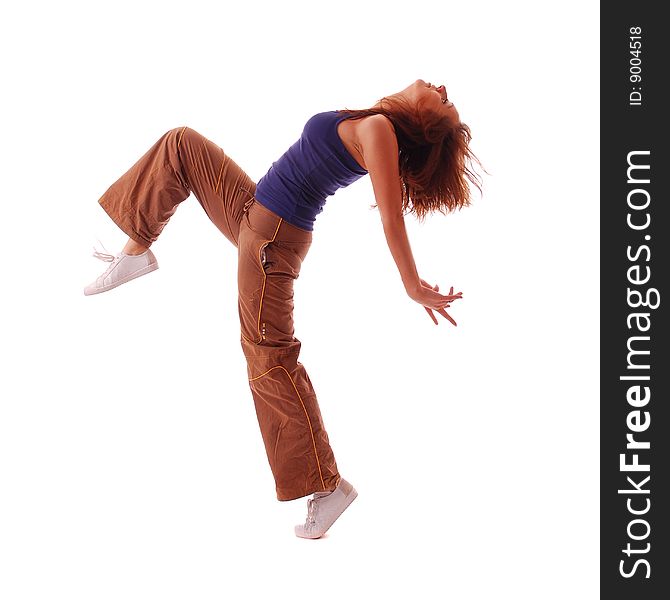 Young attractive teenage dancing over isolated white background