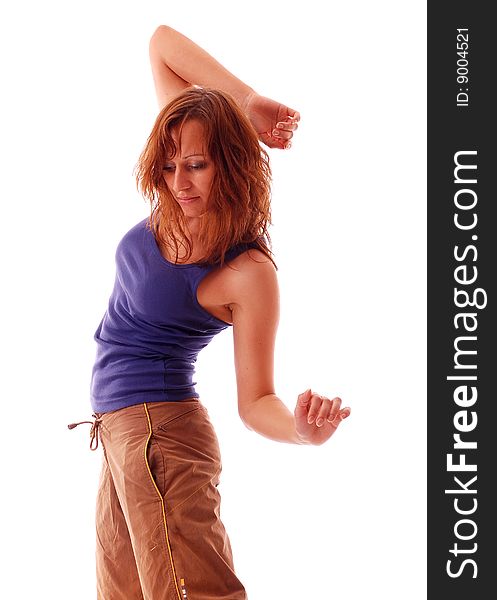 Young attractive teenage dancing over isolated white background