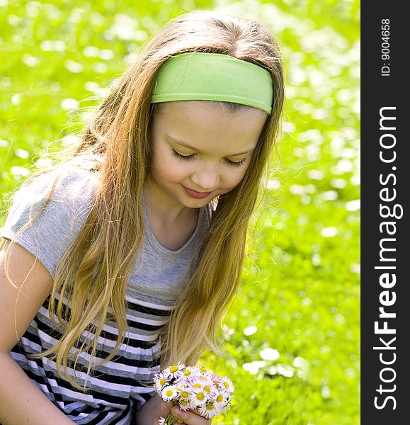 Young Girl On Field Full Of Daisies