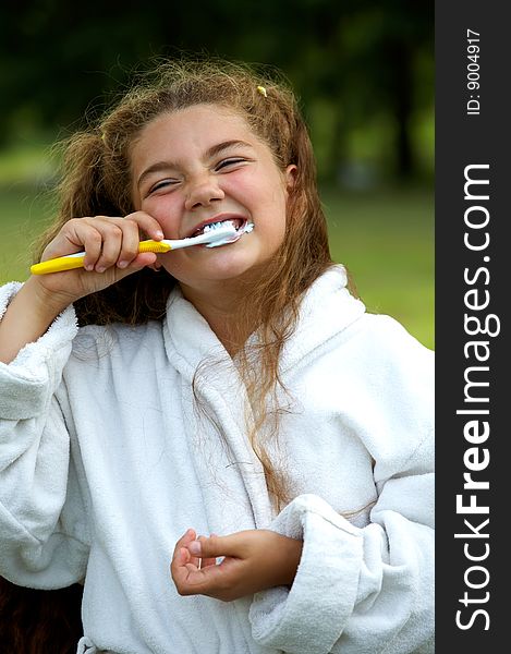 Funny Girl Brushing Teeth