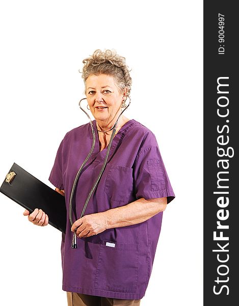 An elderly nurse in a lilac top with the stethoscope in her ears and the
clip board in her hand. On white background. An elderly nurse in a lilac top with the stethoscope in her ears and the
clip board in her hand. On white background.