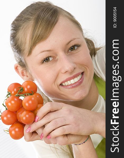 Beautiful young woman making vegetarian vegetable salad. Beautiful young woman making vegetarian vegetable salad