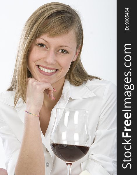 Women in kitchen with glass of wine. Women in kitchen with glass of wine