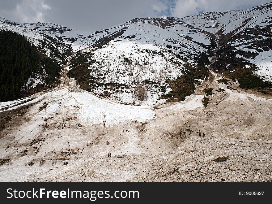 Huge snow avalanche in mountains