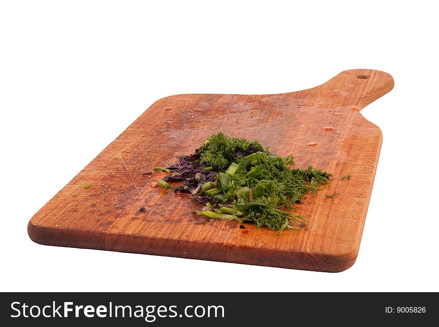 Chopped basil, dill and spring onions on cutting board. Chopped basil, dill and spring onions on cutting board