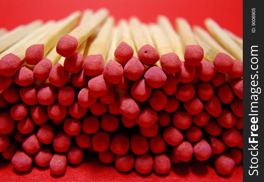 Set of matches on a red background. Set of matches on a red background