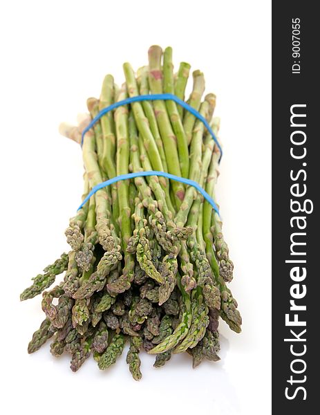 Asparagus bunch close up with focus on the tips. Asparagus bunch close up with focus on the tips