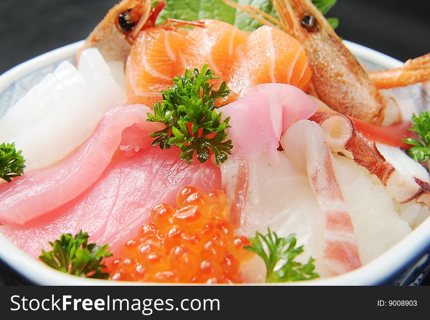 Japanese sashimi on a white dish