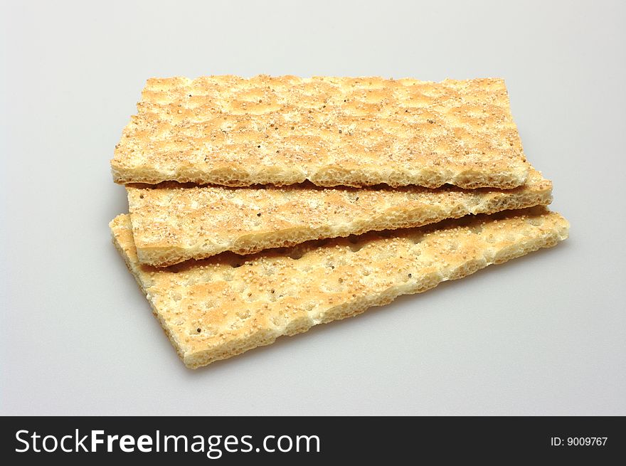 Three pieces of crispbread lying on top of each other.