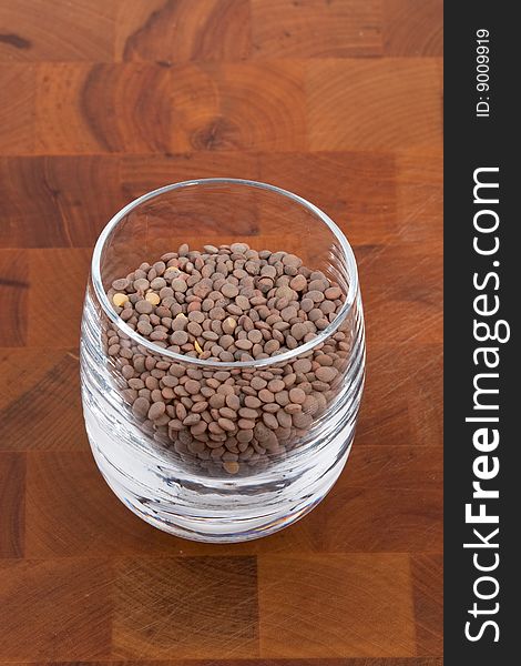 Pardina lentils in glass on wooden table